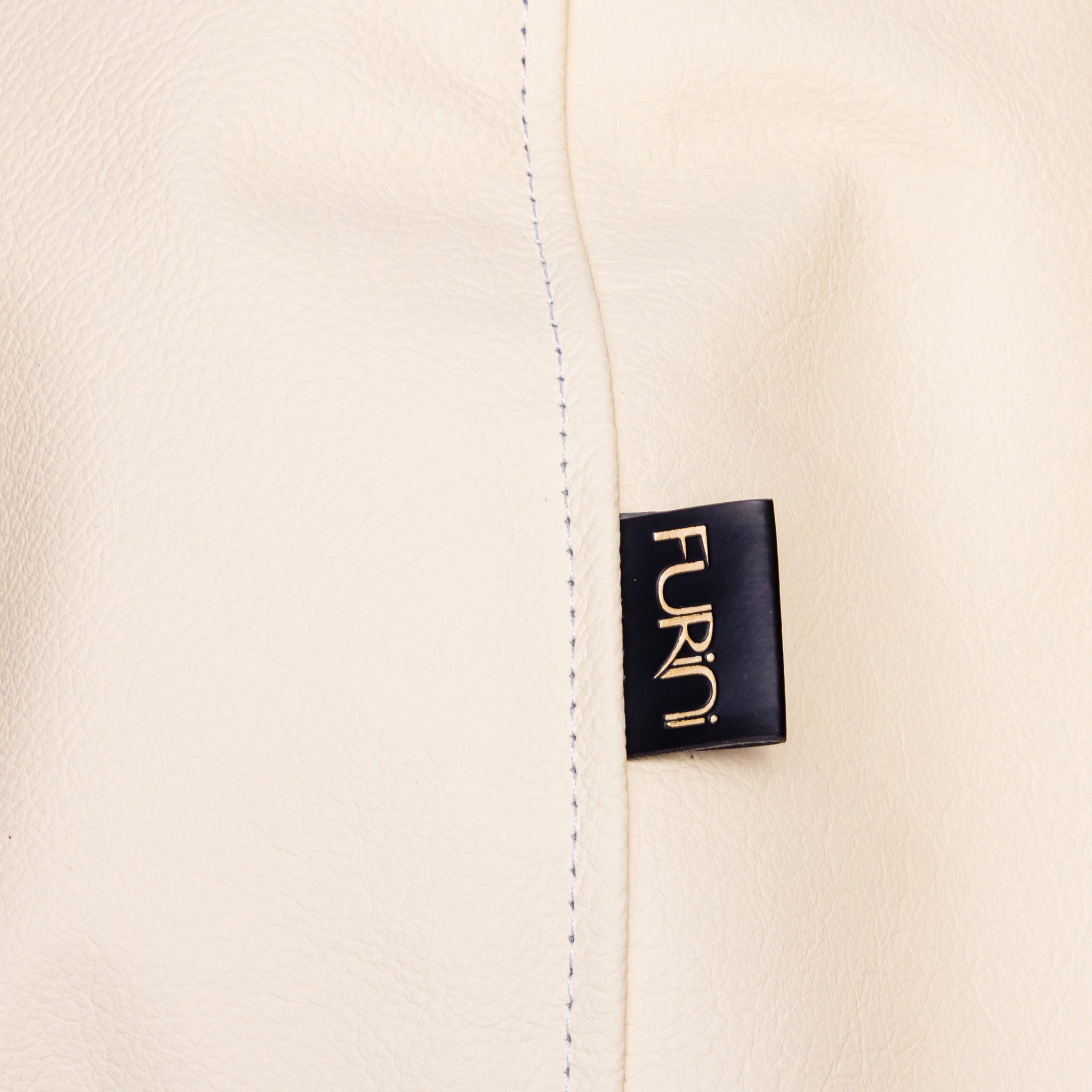 Poltrona Mini Keiko in pelle pienofiore